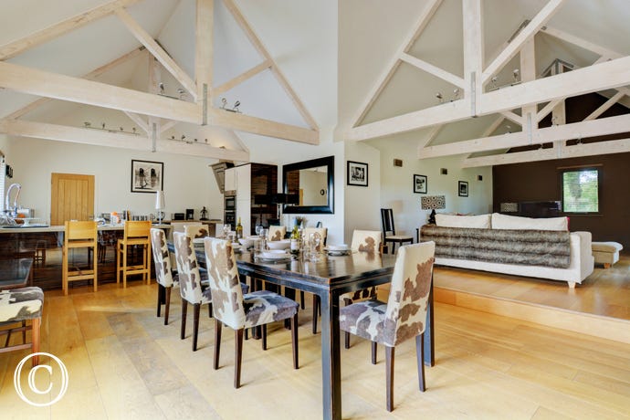 Dining table and chairs, perfect for a social meal at the end of a busy day exploring!